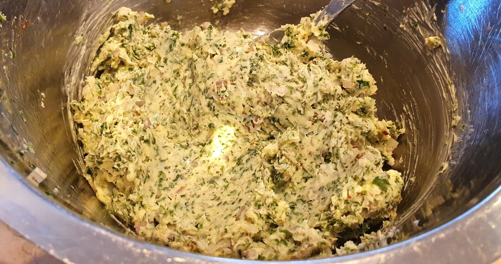 Couteaux de mer gratinés au beurre persillé